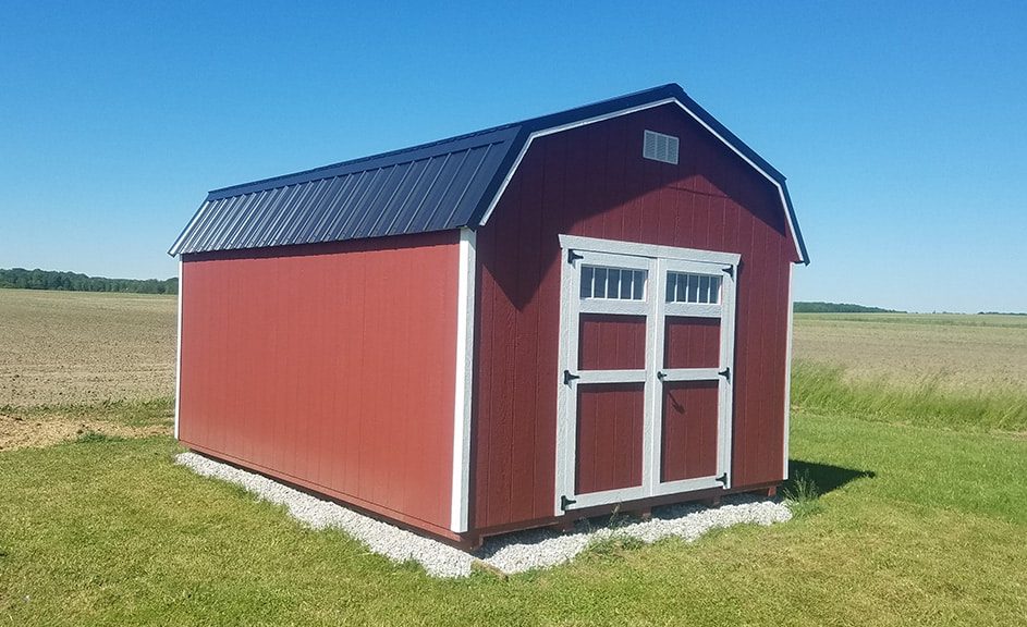 Highwall barn with Jamestown red wood siding and black metal roof