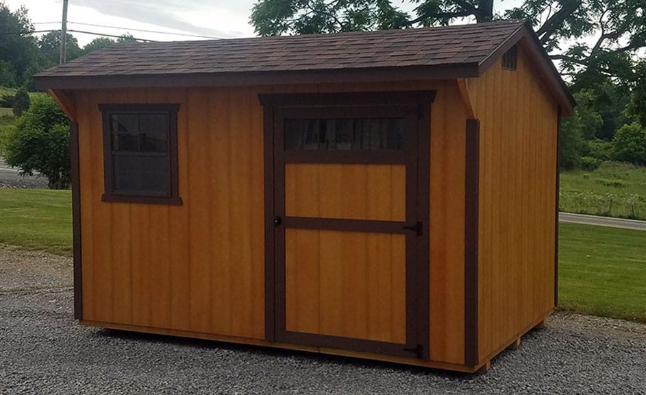 8 x 12 Saltbox barn, cedar stain with Dark Brown trim, Brownwood shingles, transom doors Cochranton Pa